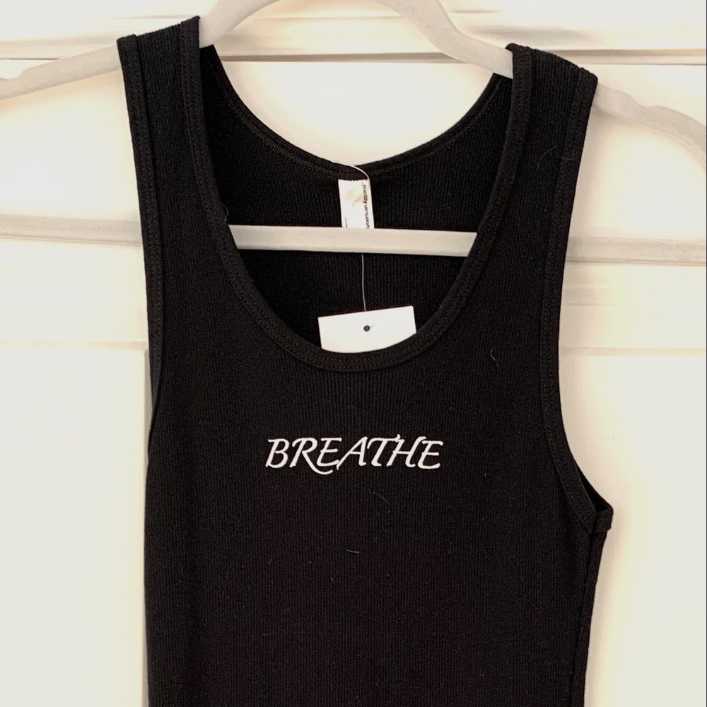 sleeveless ribbed tank top with "breathe" logo